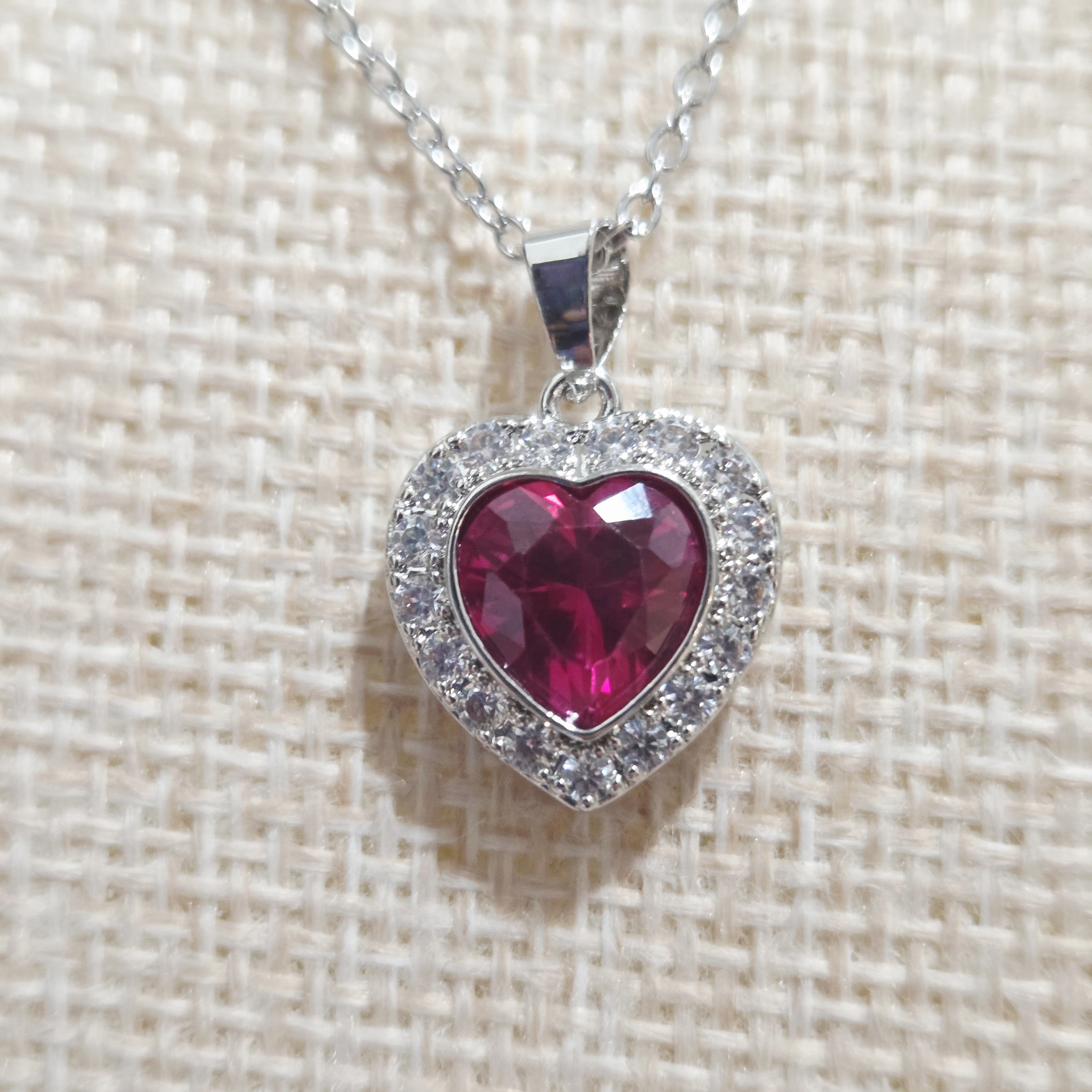 Heart-Shaped White Gold Necklace With Ruby Gemstone